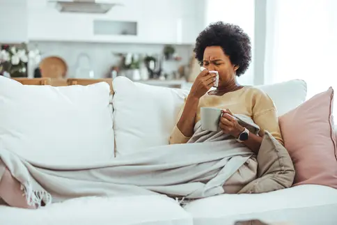 photo of black women sick with cold